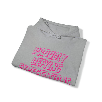 Unisex Hooded Sweatshirt - Proudly Defying Expectations