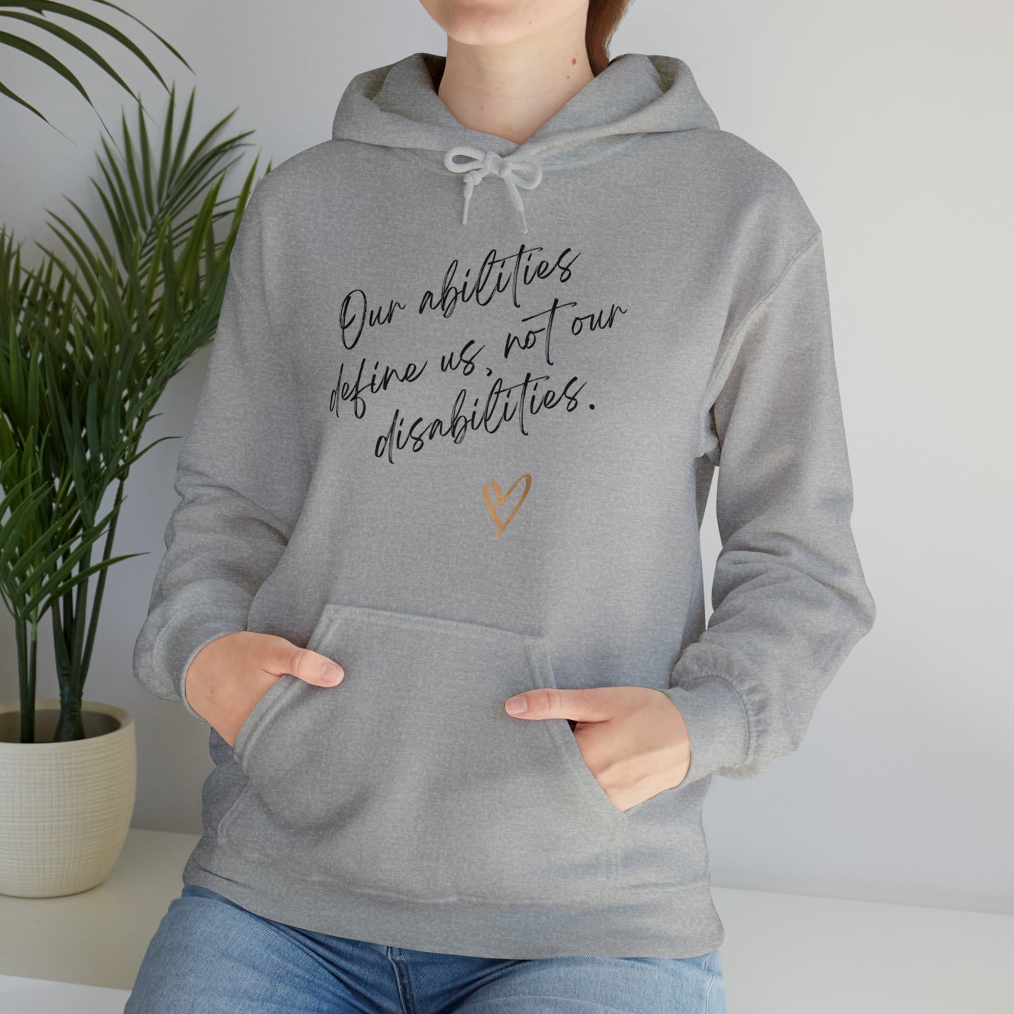 Unisex Hooded Sweatshirt - Our Abilities Define Us, Not Our Disabilities