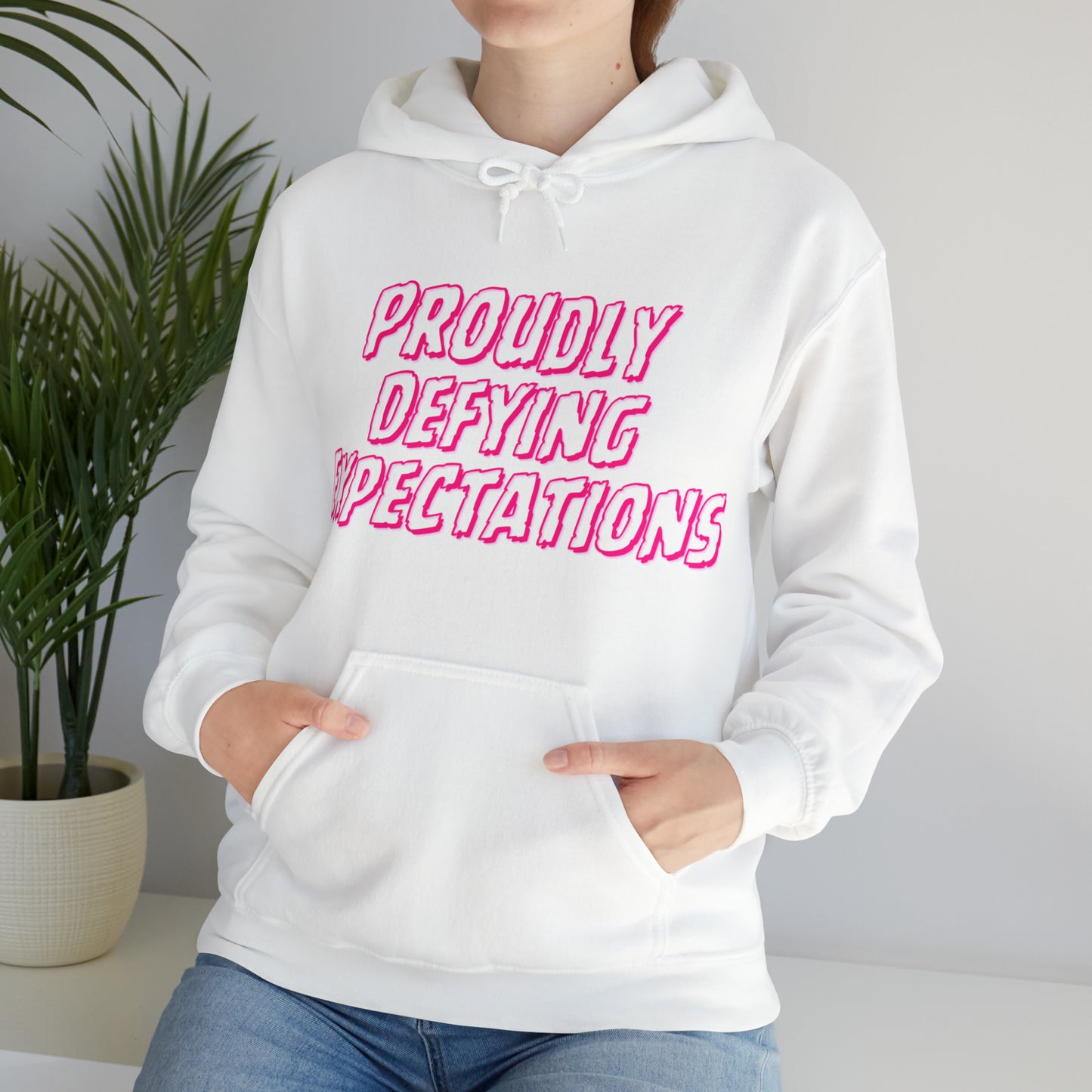 Unisex Hooded Sweatshirt - Proudly Defying Expectations