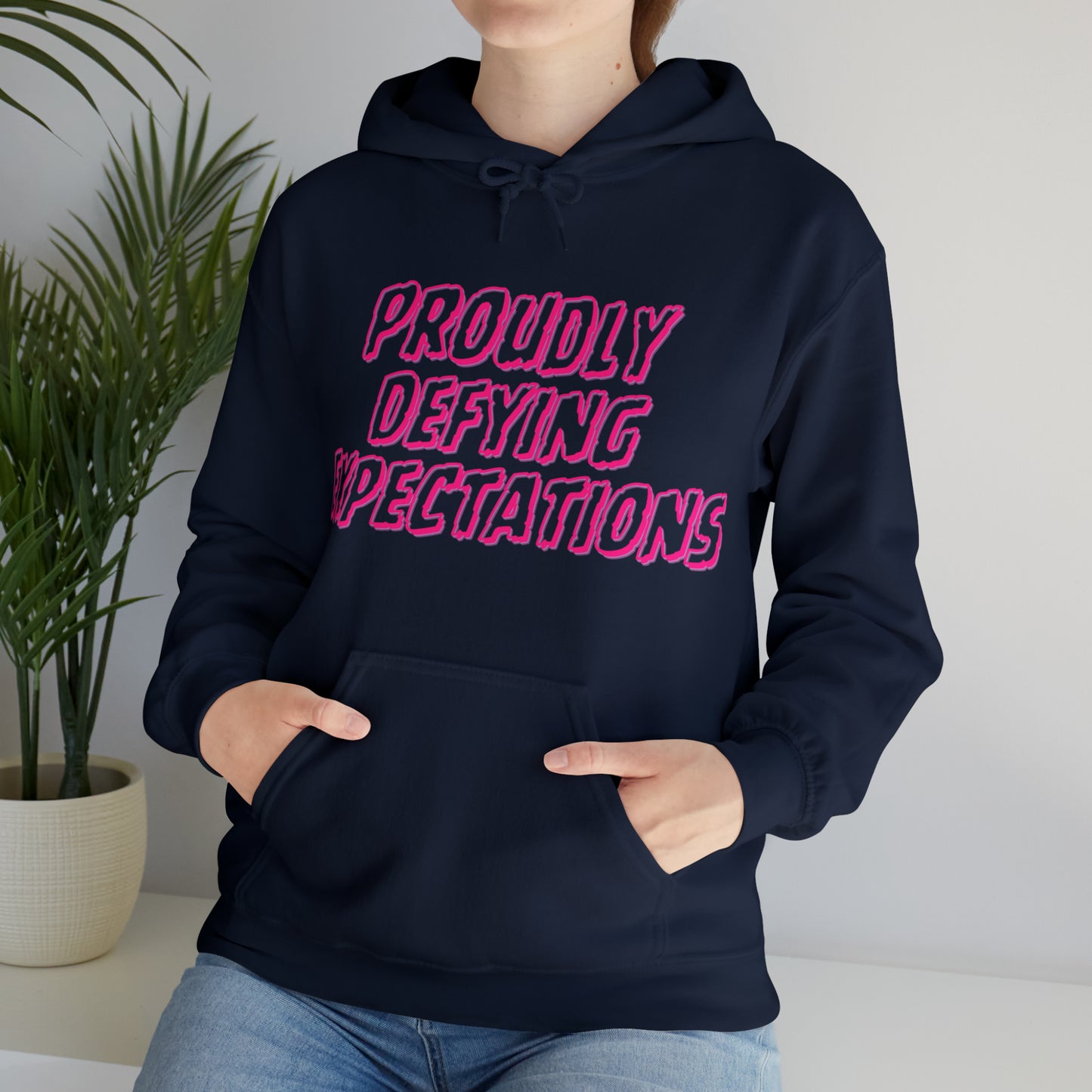 Unisex Hooded Sweatshirt - Proudly Defying Expectations