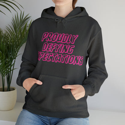 Unisex Hooded Sweatshirt - Proudly Defying Expectations